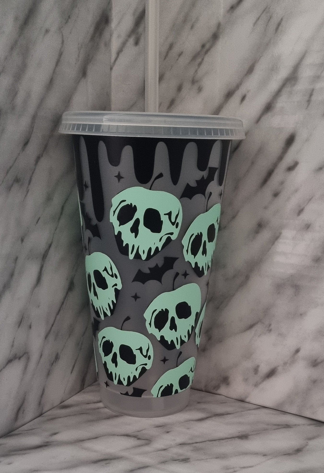https://www.neuroversecreations.co.uk/cdn/shop/products/poison-apple-glow-in-the-dark-24oz-cold-cup-pale-green-and-florescent-green-Starbucks-cup-tumbler-with-lid-and-straw-frosted-clear-cup-neuroversecreations-983.jpg?v=1668888785&width=1445